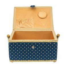 an open suitcase with polka dots on the bottom and inside, sitting against a white background