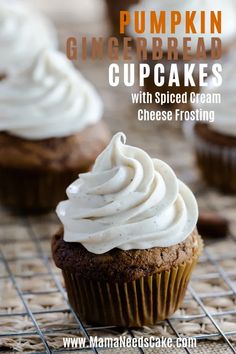 pumpkin gingerbread cupcakes with spiced cream frosting on a cooling rack