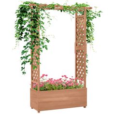 a wooden planter with pink flowers and greenery in it on a white background