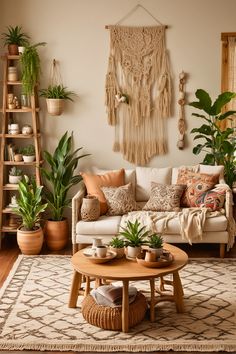 a living room filled with furniture and lots of plants