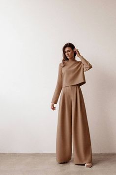 Gender: Woman Season:Spring Style: OL Type: Round neck Pullover / Wide leg Elasticity: None Thickness: Normal Fabric: Woven Fabric composition: polyester Size Bust Waist Hips Sleeve Top Length Pants Length S 102cm 66cm 104cm 61.5cm 55cm 107cm M 106cm 70cm 108cm 62cm 56cm 108cm L 110cm 74cm 112cm 62.5cm 57cm 109cm Khaki Blouse, Womens Matching Sets, Beige Pants, Brown Suits, Beige Top, Long Trousers, Brown Pants, Moda Vintage, Pantalon Large