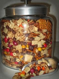 a large glass jar filled with lots of snacks