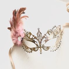 This light pink theme masquerade mask is if filigree laser design painted, embellished with Rhinestones and adorned with feathers. S H I P P I N G - Processed same day or within 24 hours. 1-2 day guaranteed delivery, add item to cart, click shipping tab for rates. Pls leave a check out note with your need date & contact number Msg for delivery time frames (Include your state/country) S I Z E Measures approx. 9 inches in length, 4 inches in Width from forehead to nose. Detailed dimensions ava Light Pink Theme, Pink Masquerade Mask, Masquarade Mask, Pink Masquerade, Masquerade Mask Women, Elegant Face Mask, Mask Woman, Couples Masquerade Masks, Metal Mask