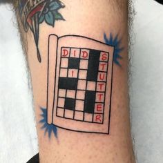 a crossword tattoo on the leg of a man's leg that reads, did it matter?