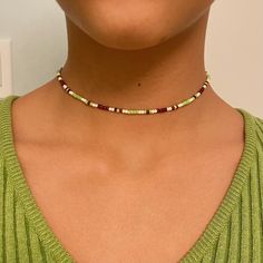 - Super cute beaded choker perfect for styling with your green and brown fits <3 - Handmade item  - Metal material: Nickel Free Zinc Alloy - Made with 0.8 mm elastic cord  - 13 inches + 1 inch chain extension - I can also make it longer or shorter! - Shipping is untracked - Message me if you have any questions <3 Green Casual Beads For Festival, Casual Green Choker Jewelry, Casual Green Choker Necklace, Green Beaded Choker For Festivals, Trendy Green Beaded Choker, Trendy Green Beaded Necklaces, Casual Green Beaded Chain, Green Tiny Beads Choker, Trendy Green Adjustable Beaded Necklaces