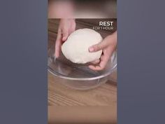 a person is kneading dough into a bowl on a wooden table with the words rest for hour