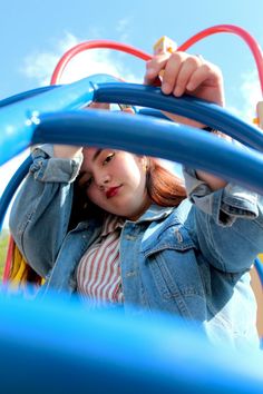 a woman is holding onto the handles of an inflatable tube