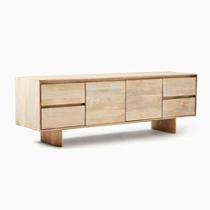 the sideboard is made out of wood and has four drawers on one end, with two