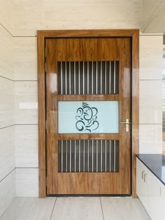 a wooden door with a glass sign on it