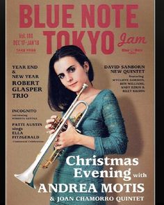 a woman holding a trumpet on the cover of a blue note tokyo magazine, christmas evening with andreamotis & joan chamoro quinet