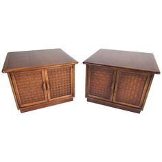 two brown wicker cupboards sitting next to each other on top of a white background