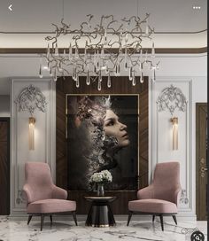 a living room with two pink chairs and a chandelier