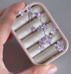 "Set of 10 Tiny Lavander flowers for brides. The flowers have a lilac colour bead in the centre of each. These handmade flowers are wire-wrapped around salon-quality \"no slip\" bobby pins.  Bobby pins are tipped for maximum comfort.   This item is ready to be shipped. It's made with lots of love and care in a clean and smoke-free home. Tiny lavender flowers Bridal flowers Tiny flowers hair pins Bridal hair flower Flower hair pins Wedding headpiece Hair accessories Bridal hair pin" Flower Hair Pins Wedding, Bridal Hair Flower, Flower Lavender, Hair Pins Wedding, Hair Pins Bridal, Lilac Colour, Flower Hair Pins, Bridal Hair Headpiece, Lilac Hair