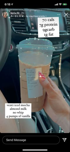 a woman holding up a cup of coffee in her hand with the caption's on it