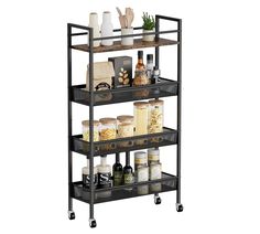 three tiered shelving unit with various items on top and bottom shelves in black