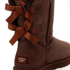 Ugg Australia Ugg Bow Boots Color: Chocolate Condition: New Size : 6 Regular Wide Super Thick And Warm Original Ugg Australia Two Bows In The Back Side. They Are Super Cute. Uggs Bow, Boots With Bows, Winter Ugg, Ugg Boots Sale, Uggs For Cheap, Ugg Boots Cheap, Abed Mahfouz, Ugg Boots Outlets, Boots Ideas