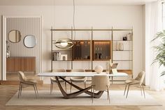 an elegant dining room with white walls and wood flooring, round table surrounded by beige upholstered chairs