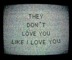 an old tv with the words they don't love you like i love you written on it