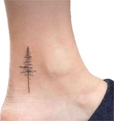 a small pine tree tattoo on the ankle