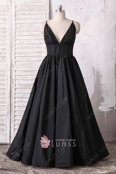 Made in taffeta, this floor length A-line prom dress is soft and fashionable with plunging V neckline. The open back of the bodice with spaghetti straps transitions into a less voluminous skirt. This A-line black prom dress is perfect for your parties. Black Taffeta Dress, Beaded Formal Dress, Dress Train, Military Ball Dresses, A Line Evening Dress, V Neck Prom Dresses, Designer Prom Dresses