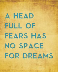 a sign that says, a head full of fear has no space for dreams