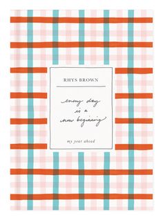 an orange and blue checkered paper with a quote on the front that says, every day is a new beginning