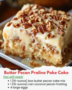 a close up of a piece of cake on a plate with pecan frosting