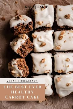 a bunch of brownies with white frosting and nuts on top are arranged in a rectangle