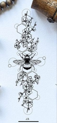 an ink drawing of a bee and flowers