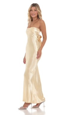 Strapless Satin Open Back Maxi Dress in Gold | LUCY IN THE SKY Gold Wedding Guest Dress, Ty Ball Dresses, Freetime Activities, Gold Prom Dresses, Open Back Maxi Dress, Prom Dress Inspo, Champagne Dress, Prom Inspo, Lucy In The Sky