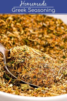 homemade greek seasoning in a white bowl with a spoon