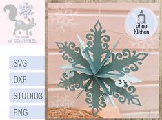 the paper snowflake is cut out and ready to be put in a vase