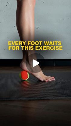 a person standing on top of a mat with their foot in the middle of it