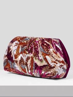 In stock and ready to ship in 1-2 business days. This chic and versatile clutch features a mesmerizing array of multicolored sequins on the front, creating a stunning visual effect that catches the light and captures attention. The back is crafted from luxurious velvet in a gorgeous shade of fuchsia, adding a soft and tactile element to the design. Inside, you'll find a convenient zip pocket, providing a secure space for your essentials. Measurements: 14.17 IN/36 CM (L) x 1.57 IN/4 CM (W) x 7.87 Multicolor Sequined Evening Bag, Multicolor Sequined Evening Clutch, Evening Multicolor Sequins Bag, Glamorous Multicolor Clutch For Party, Multicolor Pouch Clutch For Evening, Luxury Multicolor Pouch Clutch, Luxury Multicolor Pouch Evening Bag, Elegant Multicolor Sequined Bags, Glamorous Multicolor Clutch Bag