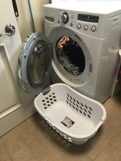 a washer and dryer sitting next to each other