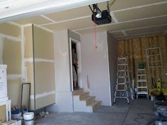 the interior of a house being remodeled with drywalling and walls in place for painting