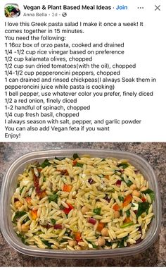 a plastic container filled with pasta and veggies on top of a granite counter