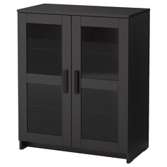 a black cabinet with two doors and shelves