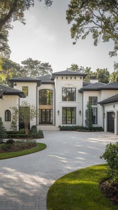 a large white house with lots of windows