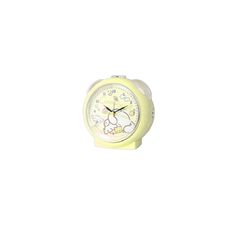 a yellow alarm clock with hello kitty on it's face is shown against a white background