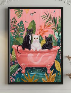 three black and white cats sitting in a pink bathtub surrounded by tropical plants on a pink background