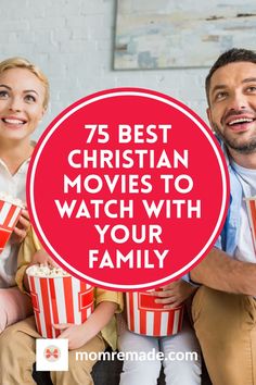 a man and woman sitting next to each other holding popcorn buckets with the words 75 best christian movies to watch with your family