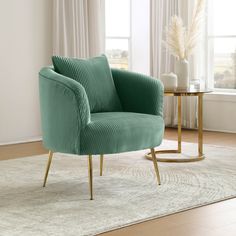 a green chair sitting on top of a rug next to a window