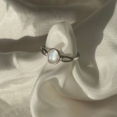 Adjustable to fit all ring sizes Elegant Stamped 925 Open Opal Ring, Elegant Open Opal Ring Stamped 925, Adjustable Silver Rings With Round Stone, Adjustable Moonstone Ring For Formal Occasions, Minimalist Silver Open Ring Jewelry, Spiritual Moonstone Ring With Round Stone, Adjustable Birthstone Topaz Open Ring, Adjustable Open Topaz Ring As Birthstone, Dainty Oval Sterling Silver Stackable Rings