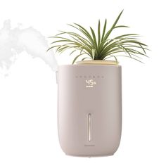 Dry indoor air can lead to static electricity, thirsty houseplants, and even dry skin—making breathing and sleeping conditions uncomfortable. The Homedics Natura Ultrasonic Warm & Cool Mist Humidifier combats dryness with a nozzle that converts water into a fine warm or cool mist, evenly releasing the perfect amount of moisture for spaces up to 402 sq. ft.* This sleek, modern humidifier, consciously crafted with recycled materials, not only enhances your decor but also includes a programmable di Modern Humidifier, Plant Humidifier, Waterless Diffuser, Paraffin Bath, Baby Sound Machine, Percussion Massager, Mist Humidifier, Crafts From Recycled Materials, Cool Mist Humidifier