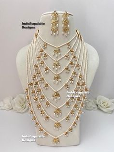 Satlada Kundan Raani Haar comes with beautiful Earrings/bridal jewelry/Long necklace Set/Rani Haar/long Mala set/Pearl long necklace/Seven layer long necklace  Bridal /Indian Wedding jewelry/bridal jewelry/ Indian jewelry /Kundan Jewelry/Kundan pearl choker/ Punjabi necklace/ Pakistani jewelry/High quality Indian Jewelry Standard shipping/delivery timeline Below are the estimated delivery times after the order is shipped/ dispatched ---> USA delivery timeline * 4-8 business days to major urban centers in USA. It may take 2-3 days extra to remote locations ---> Canada delivery timeline  * GTA  & Montreal : 2-3 business days  * Rest of Ontario/Quebec : 2-4  business days * Rest of Canada: 4-8 business days (Please consider 1-2 extra business days to very remote locations) ---> Europe/Middle Kundan Mala, Punjabi Necklace, Indian Long Necklace, Pearl Long Necklace, Bridal Indian, Long Necklace Set, Jewelry Kundan, Rani Haar, Sabyasachi Jewellery