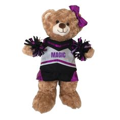 a brown teddy bear wearing a purple and black cheerleader outfit with the word magic on it's chest