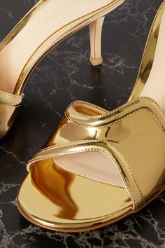 GIANVITO ROSSI 70 mirrored-leather mules | NET-A-PORTER Modern Gold Open Heel Heels, Sleek Gold Sandals For Evening, Sleek Gold Evening Sandals, Sleek Gold Leather Heels, Luxury Gold Sandals For Night Out, Gold Sleek Open Toe Heels, Sleek Gold Heels With Padded Heel, Sleek Gold Open Toe Heels, Glamorous Gold Leather Heels