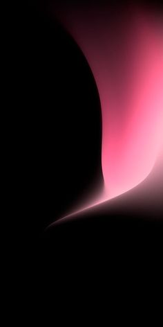 an abstract black and pink background with light coming from the top right corner in the center