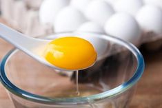 an egg being boiled in a glass bowl